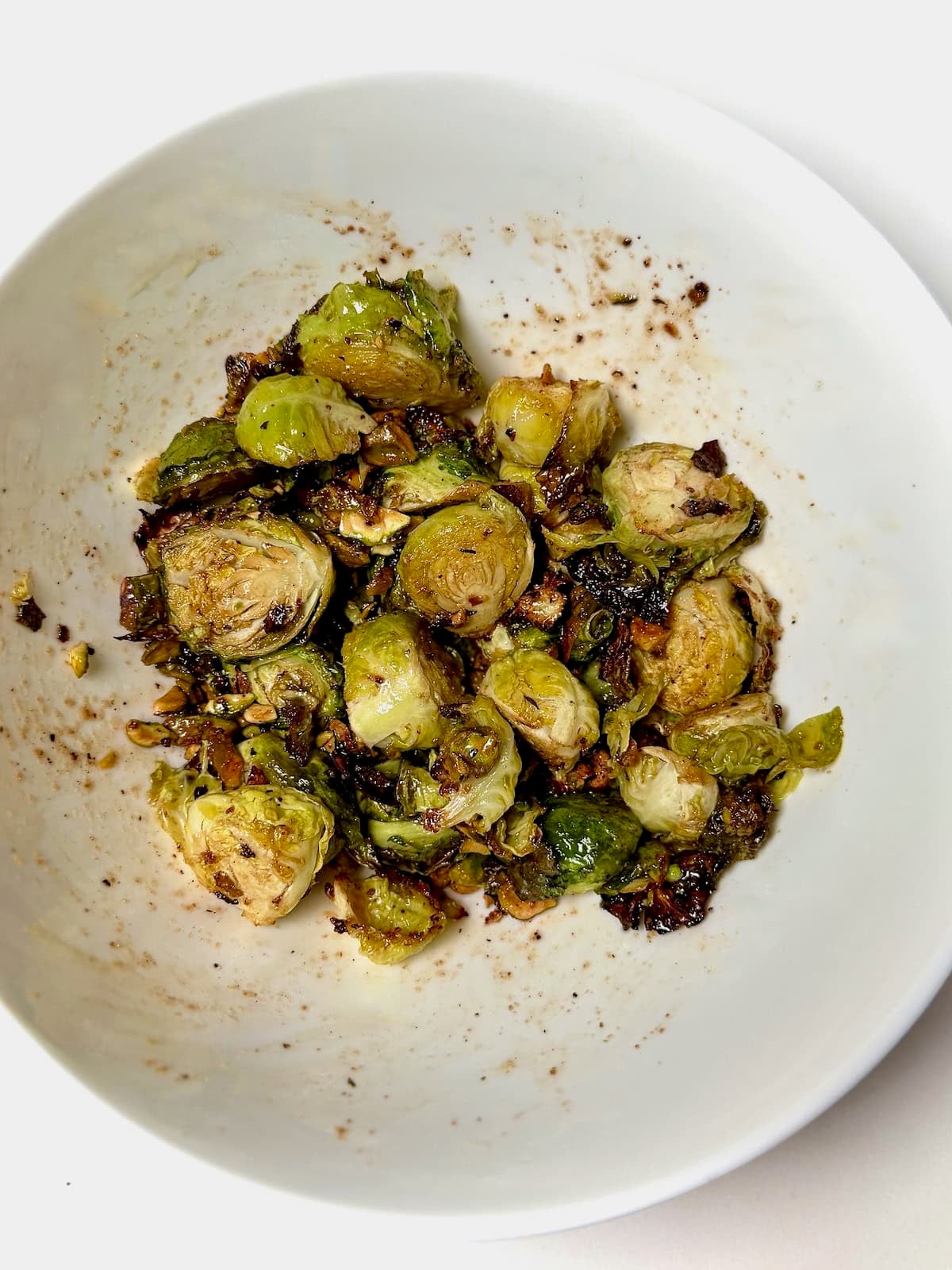 Finished brussels sprouts tossed with honey and pistachios.