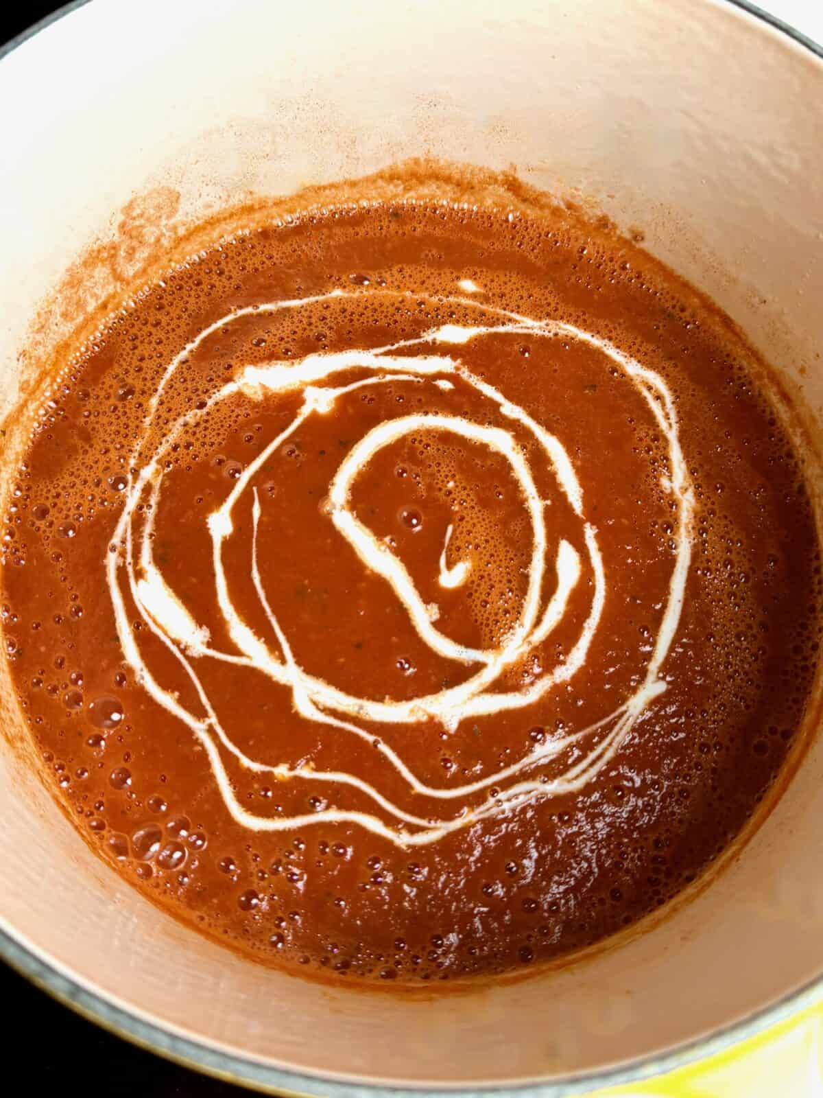 Cream swirled into easy tomato soup for a smooth and creamy finish.