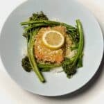 Foil packet salmon with baby broccoli and lemon.
