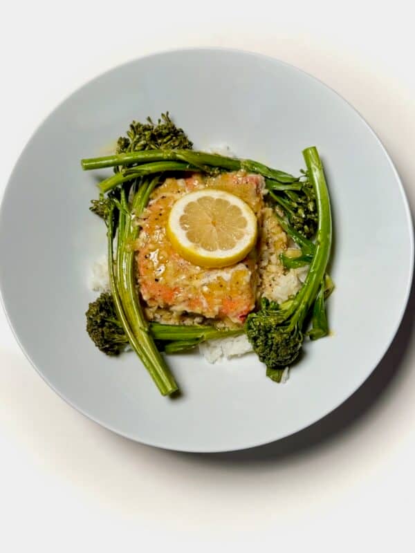 Foil packet salmon with baby broccoli and lemon.