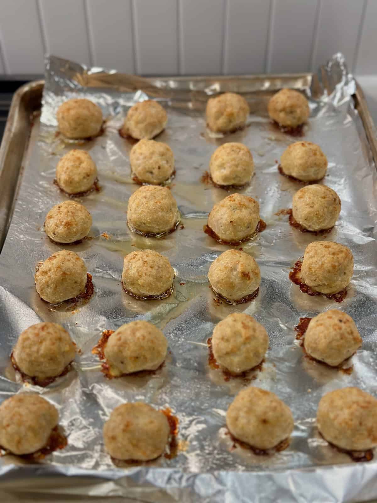 Baked Chicken Meatballs on Baking Sheet