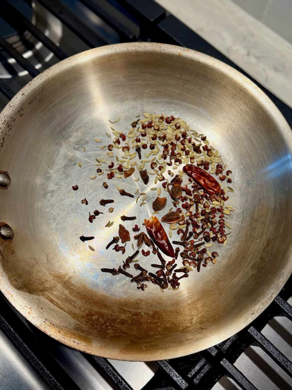 Whole spices toast in a dry skillet until fragrant.