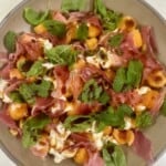 Bowl with cantaloupe, prosciutto, and burrata