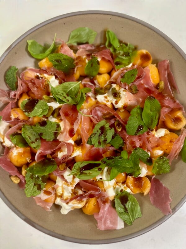 Bowl with cantaloupe, prosciutto, and burrata