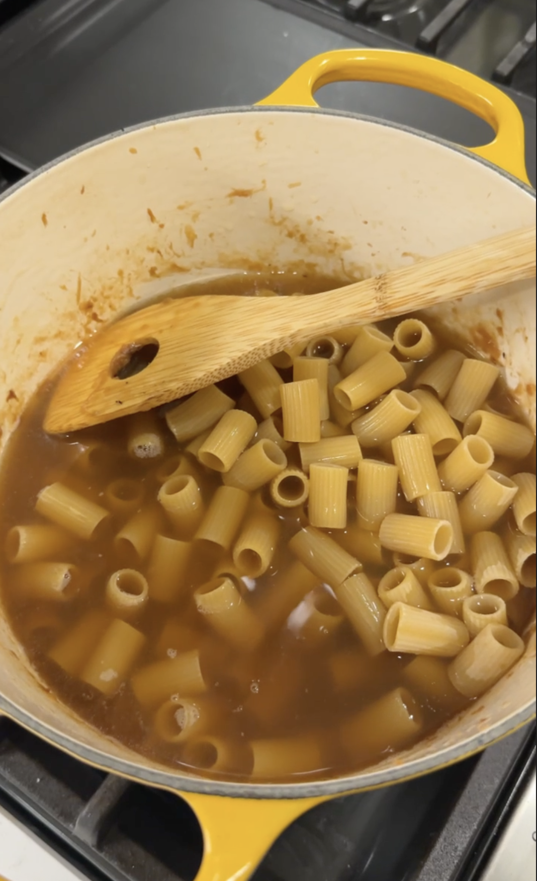 Dutch Oven with Uncooked Pasta and Broth