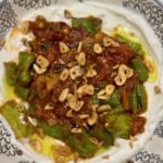 Bowl with labneh, tomatoes, and shishito pepper