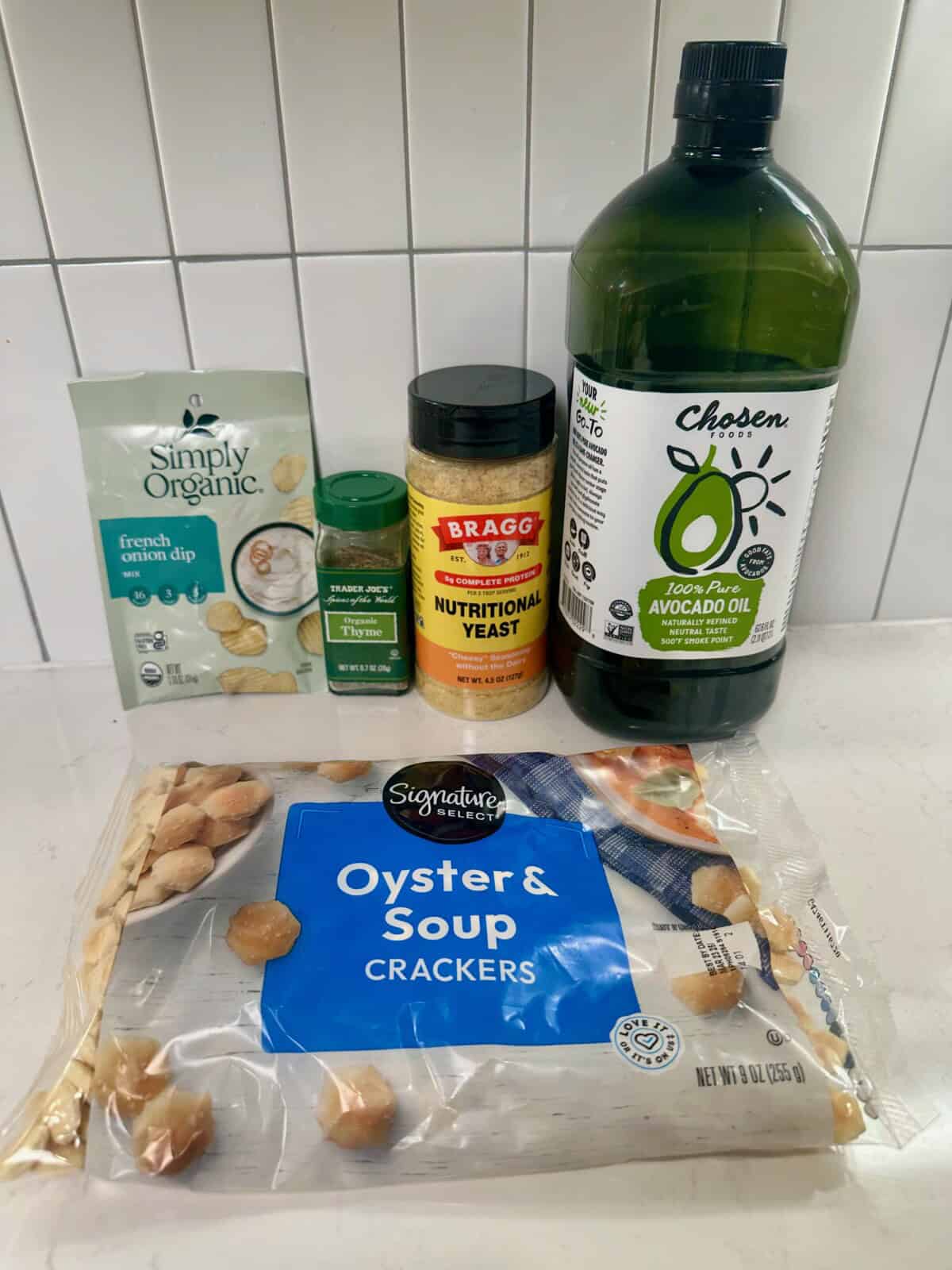 Packet of french onion dip mix, dried thyme, nutritional yeast, avocado oil, and oyster crackers