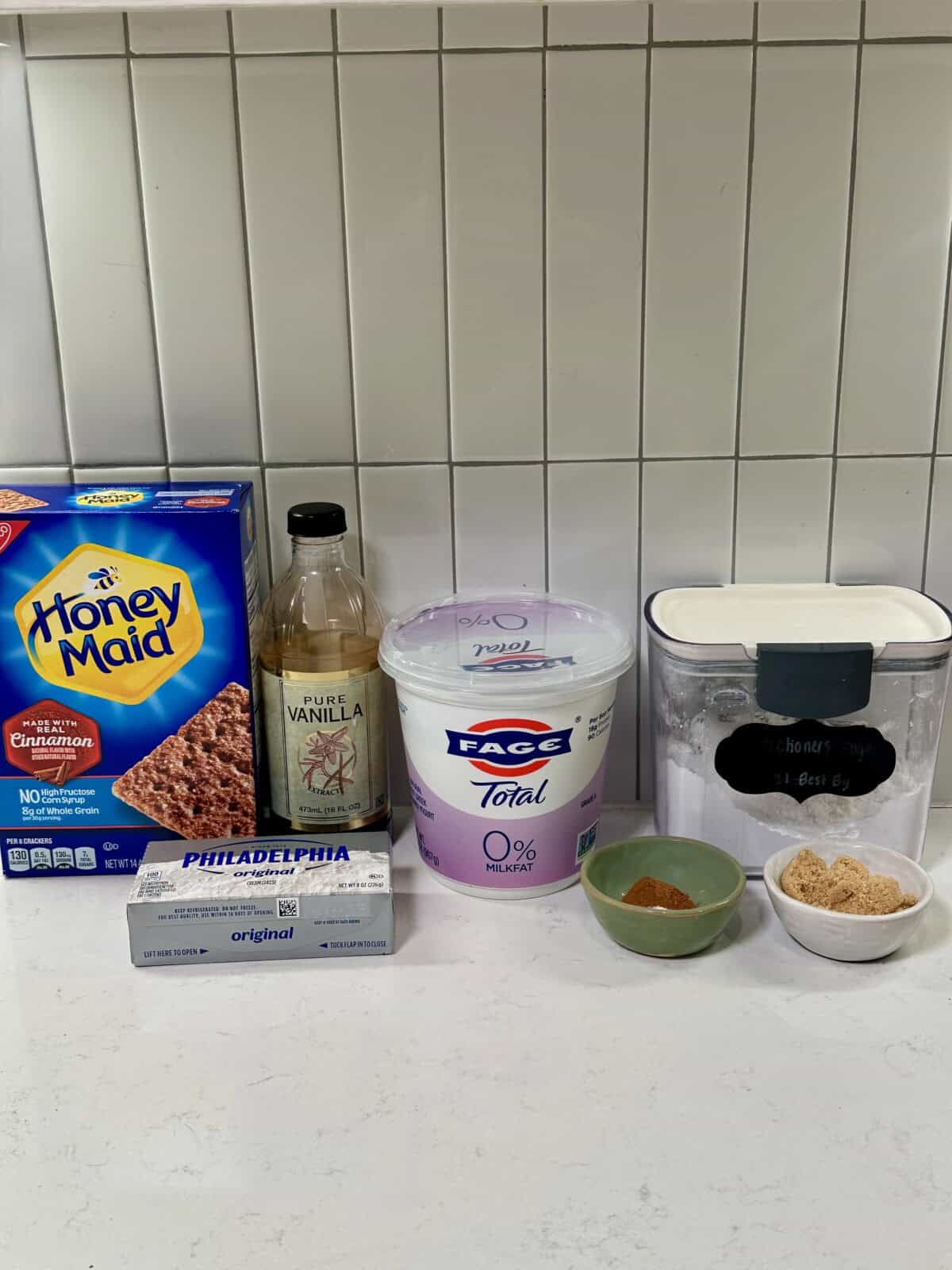 Cinnamon graham crackers, vanilla, cream cheese, yogurt, cinnamon, brown sugar, and powdered sugar