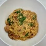 White bowl with One Pot Spicy Italian Sausage Orzo.