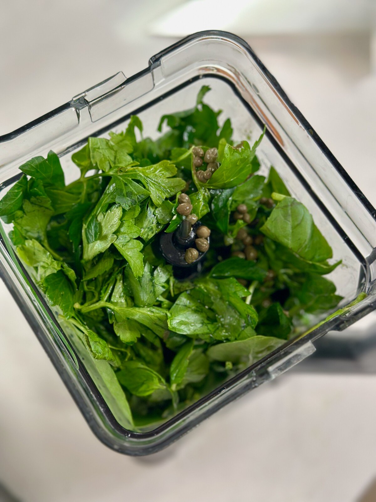 Spinach and herbs in blender