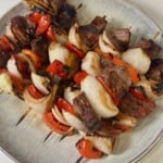 Grilled Steak Kabobs with Peppers and Onions on a Plate