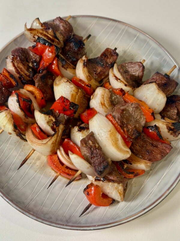 Grilled Steak Kabobs with Peppers and Onions on a Plate