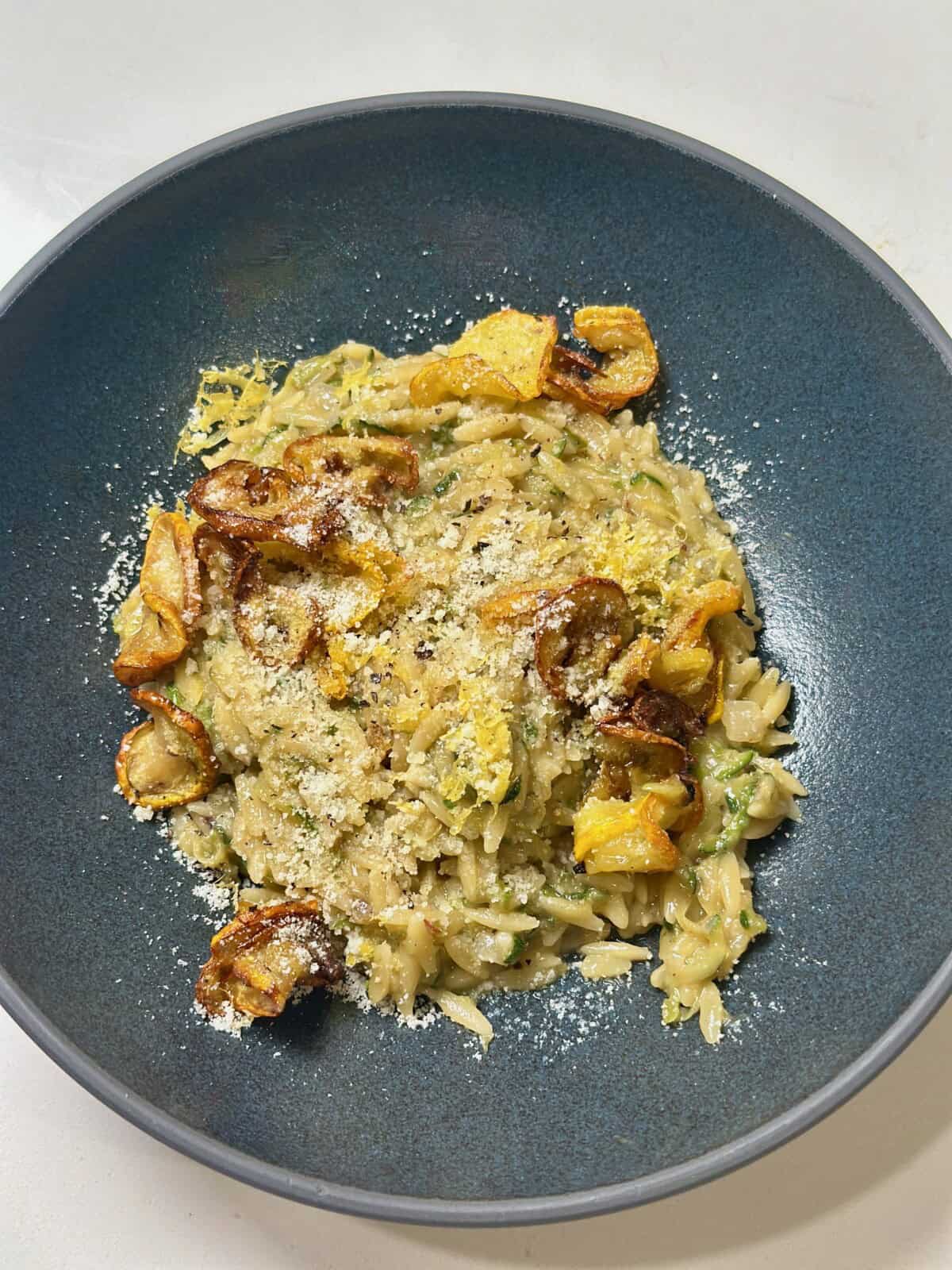 Creamy zucchini orzo plated.