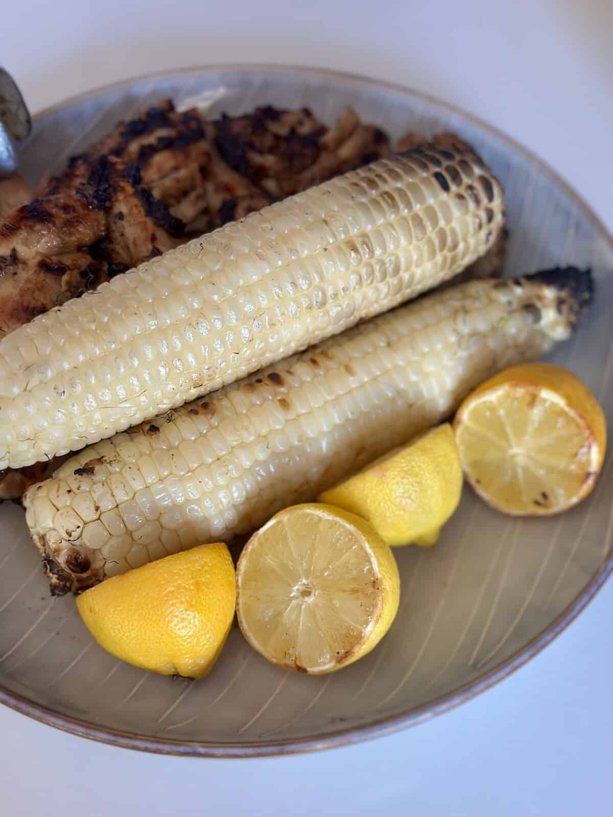 Grilled Corn and Lemon on Plate