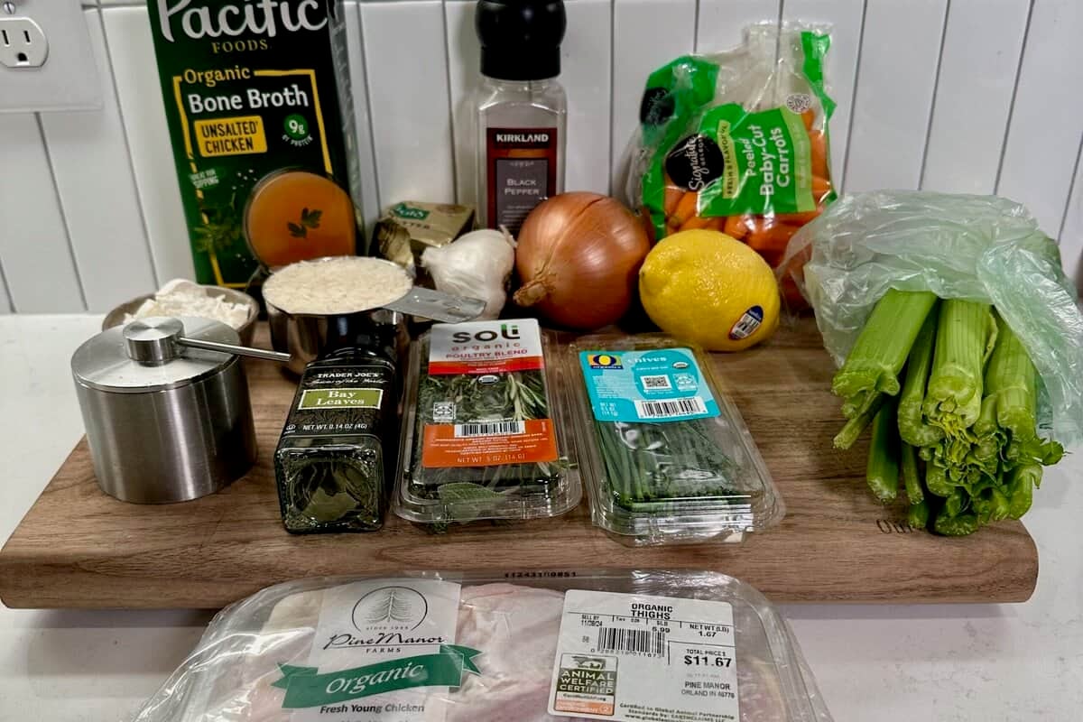 Ingredients for Herby Chicken and Rice Soup. Chicken broth, flour, rice, salt, pepper, garlic, onion, carrots, celery, lemon, fresh rosemary, fresh sage, fresh thyme, fresh chives, dried bay leaves, chicken thighs