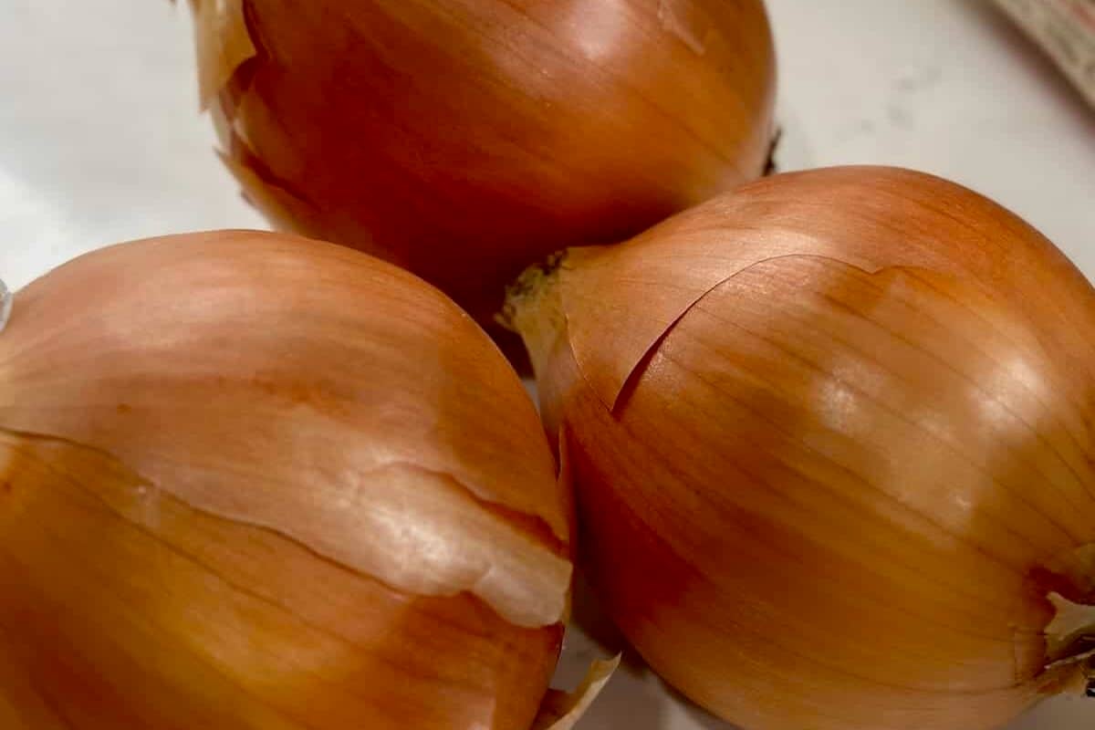 Three yellow onions.