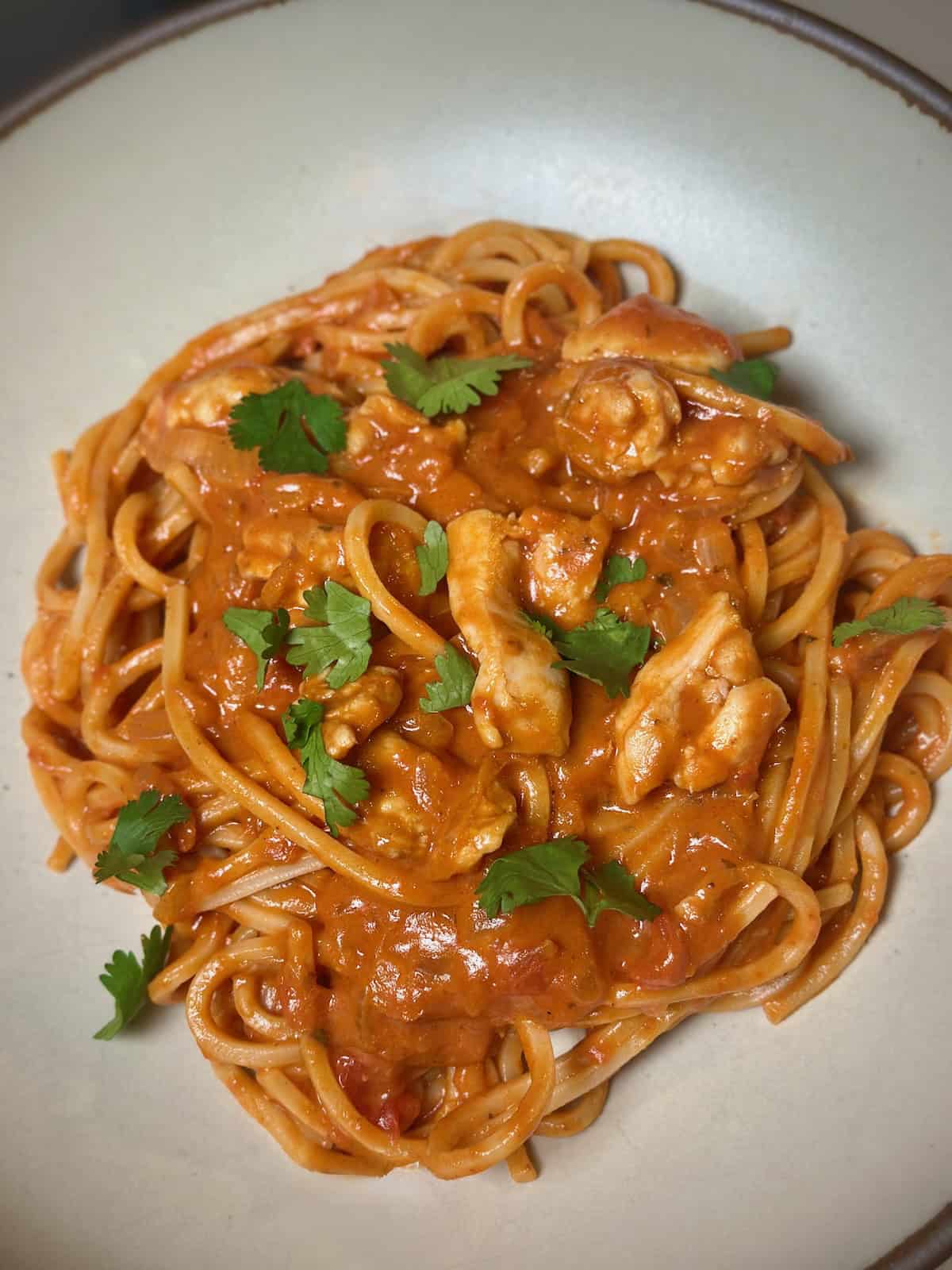 Chicken tikka masala pasta with simmer sauce plated.